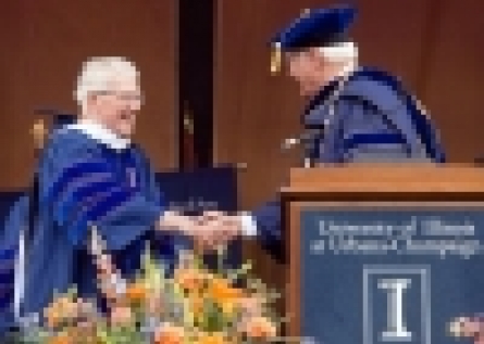 Nugent shaking hands with Easter at graduation ceremony